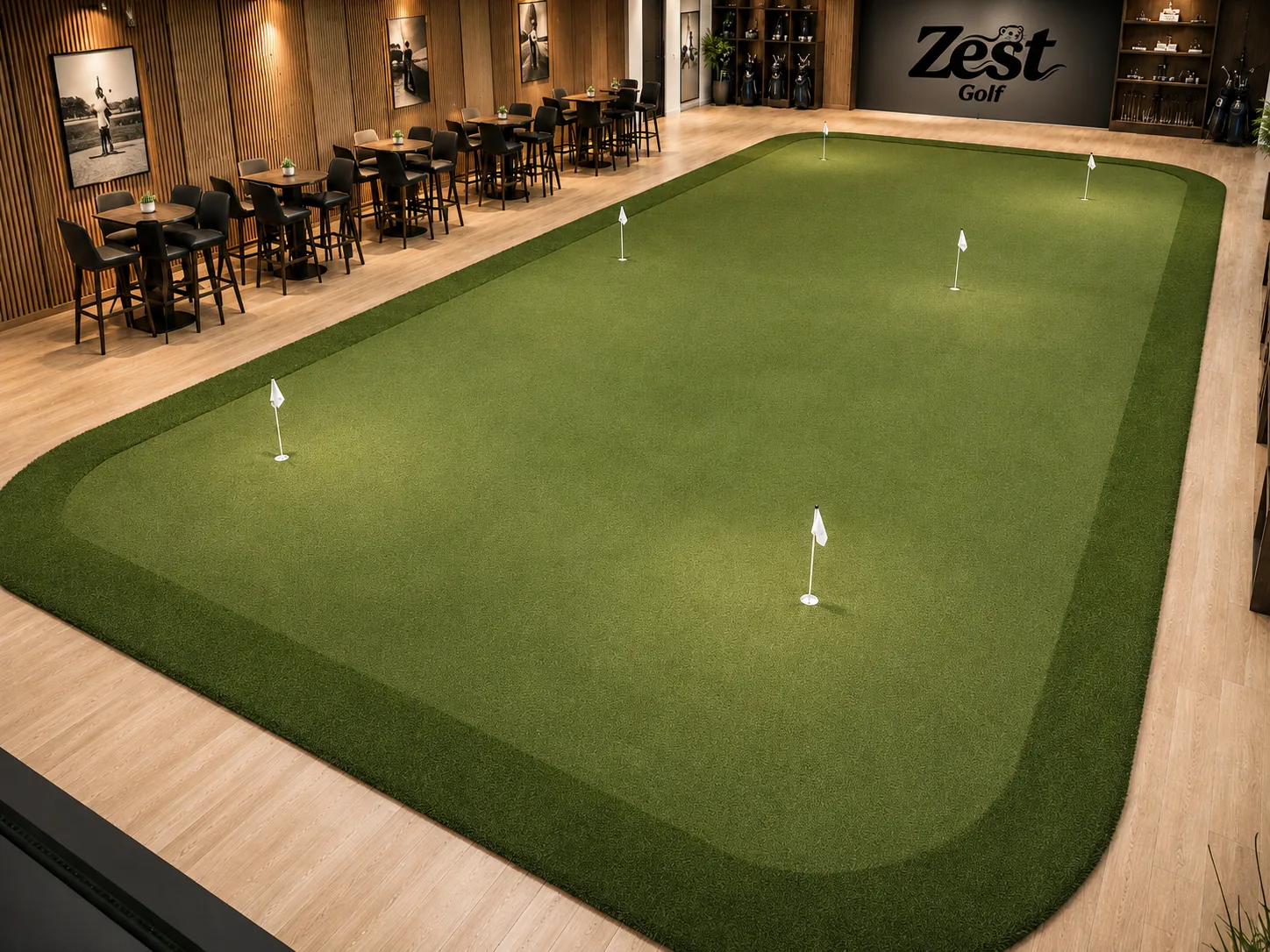 Zest Golf Houston indoor putting area with lounge seating